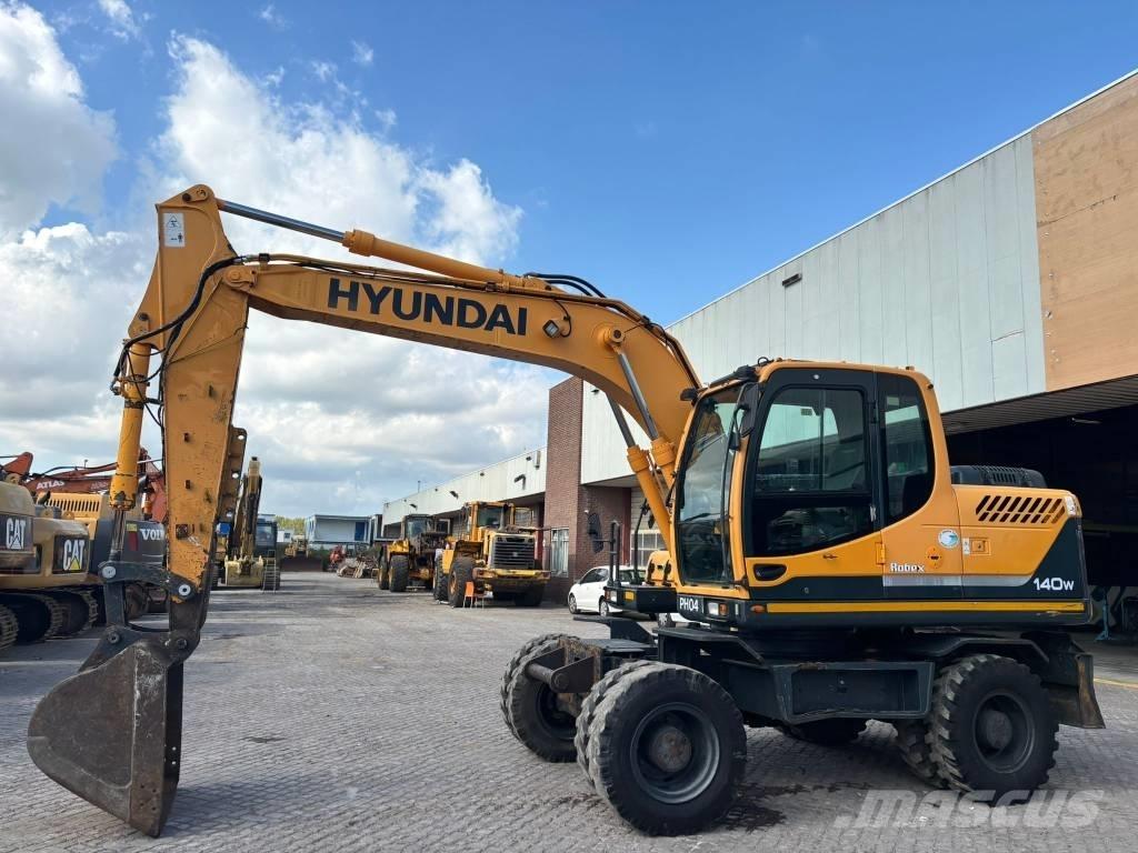 Hyundai 140W-9 Колёсные экскаваторы