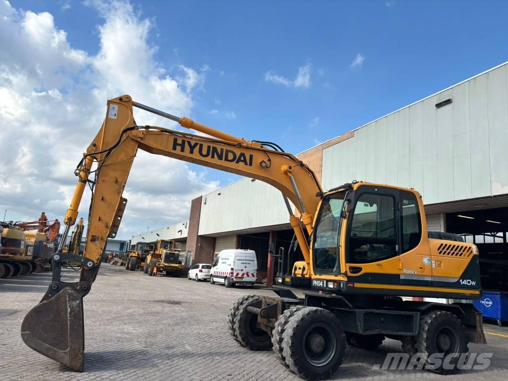 Hyundai 140W-9 Колёсные экскаваторы