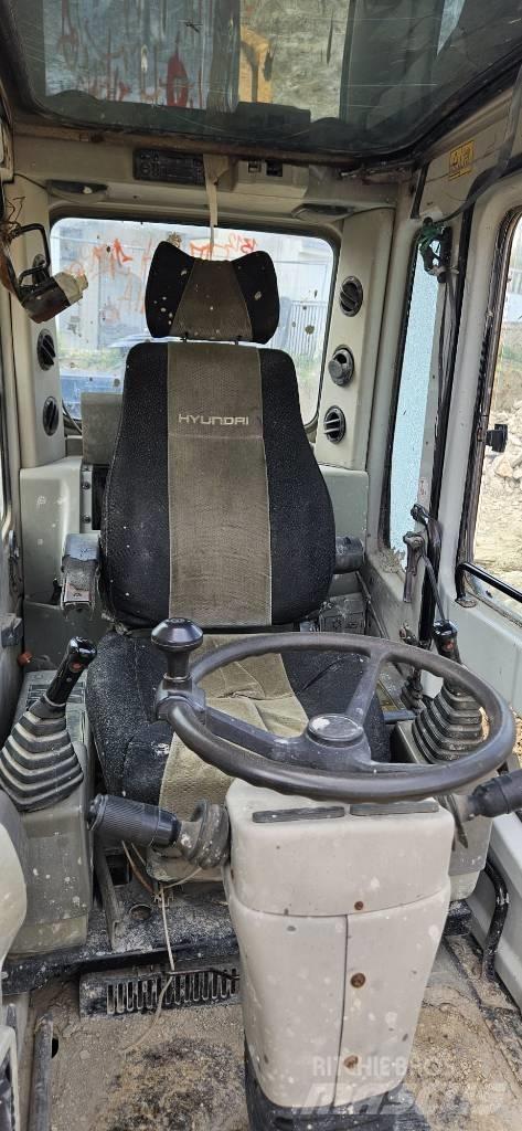 Hyundai 140W-7 Колёсные экскаваторы