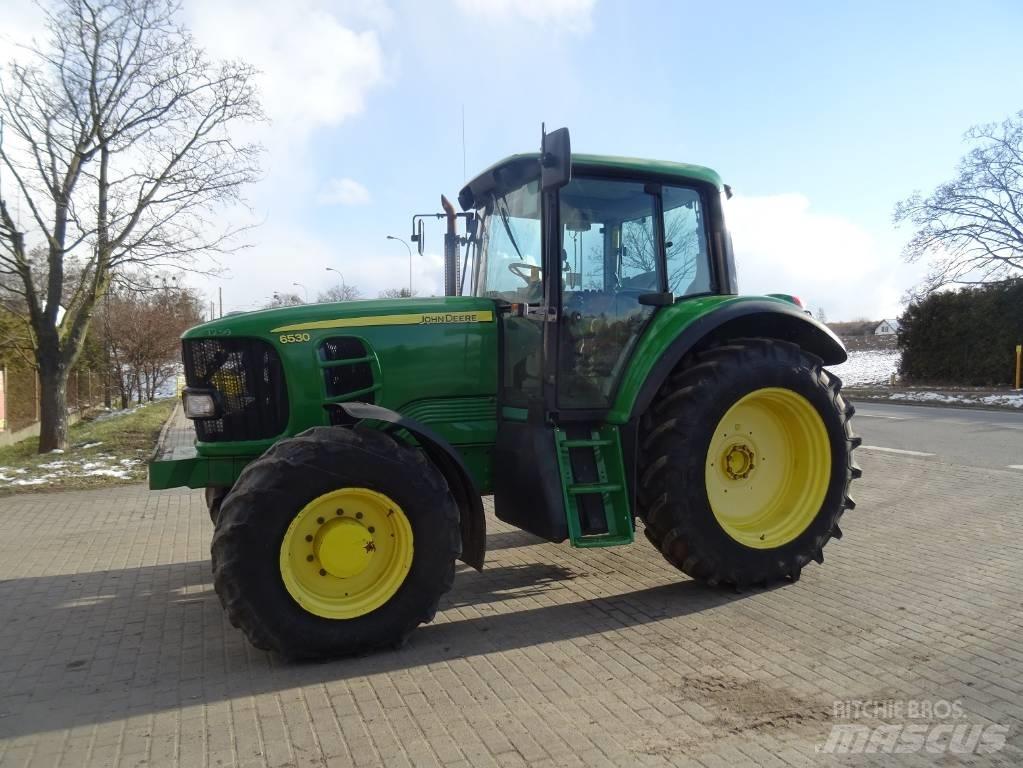 John Deere 6530 Трактора