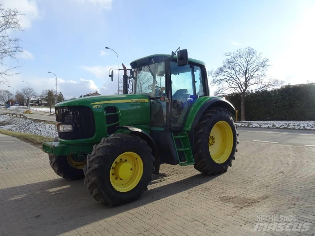 John Deere 6530 Трактора