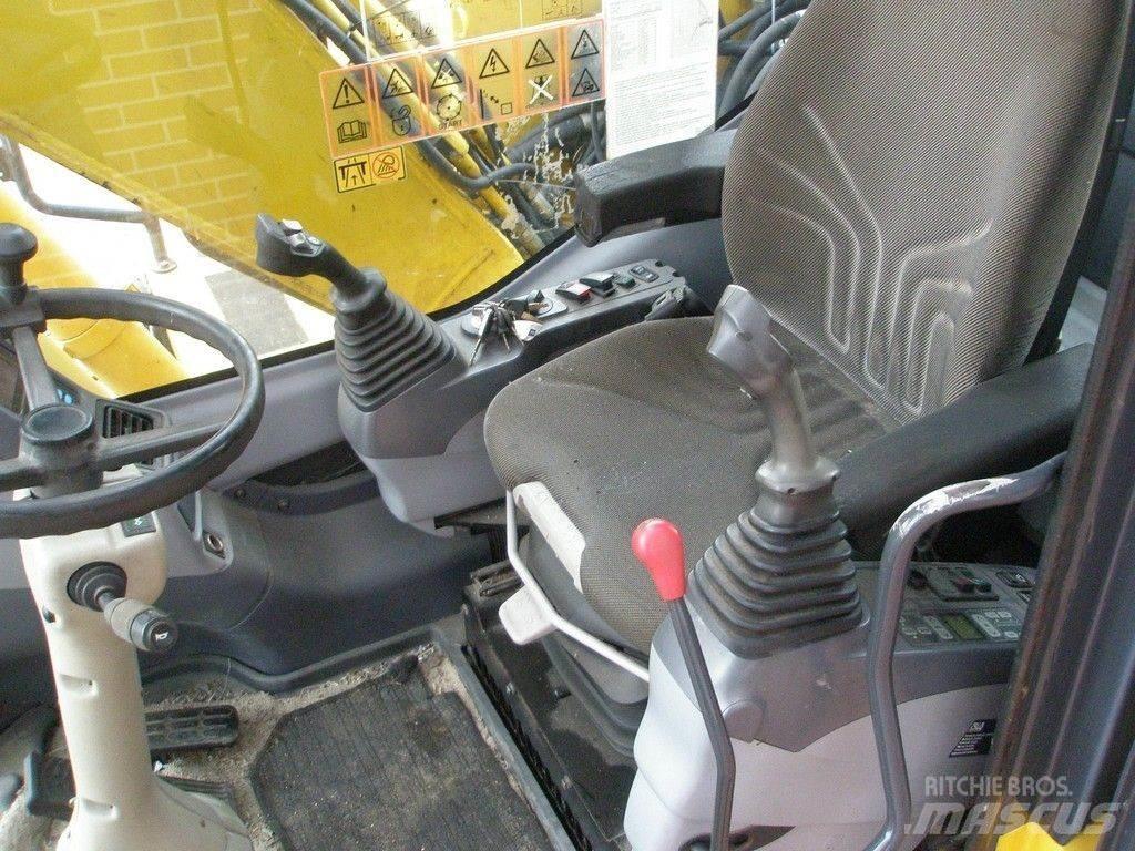 Komatsu PW140-7 Колёсные экскаваторы