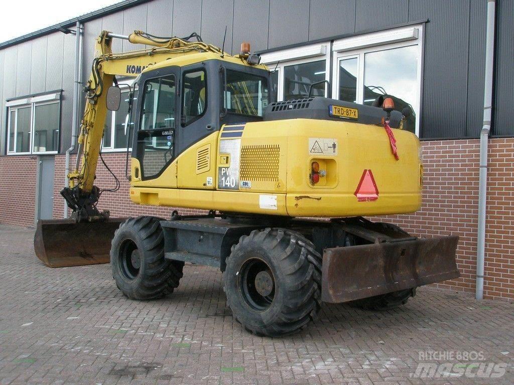 Komatsu PW140-7 Колёсные экскаваторы