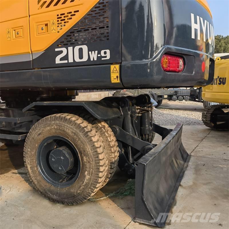 Hyundai 210W -9 Колёсные экскаваторы