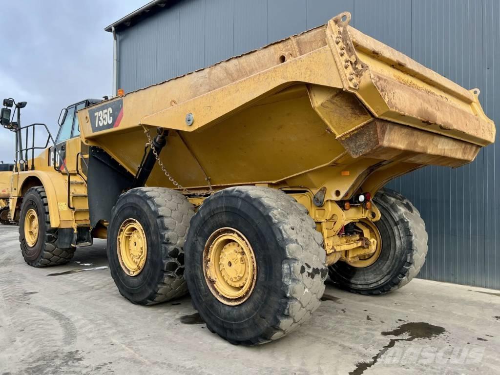 CAT 735C Шарнирно-сочленённые самосвалы