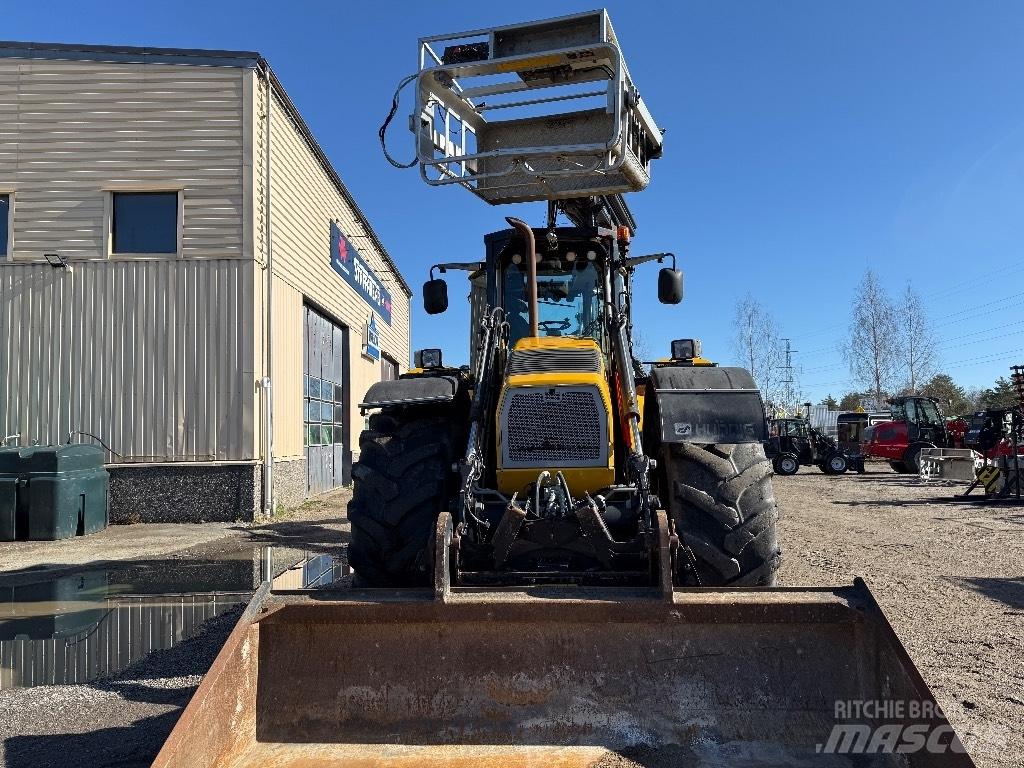 Huddig 1260 C Экскаваторы-погрузчики