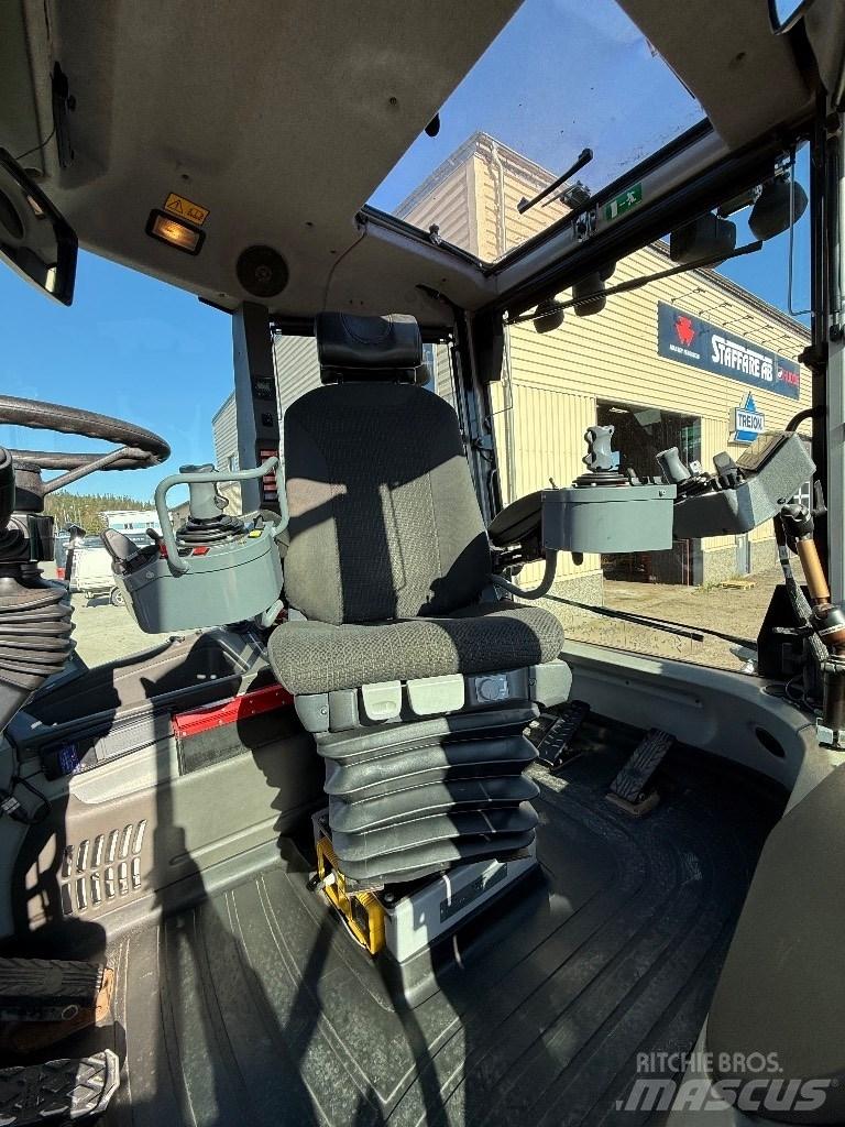 Huddig 1260 C Экскаваторы-погрузчики
