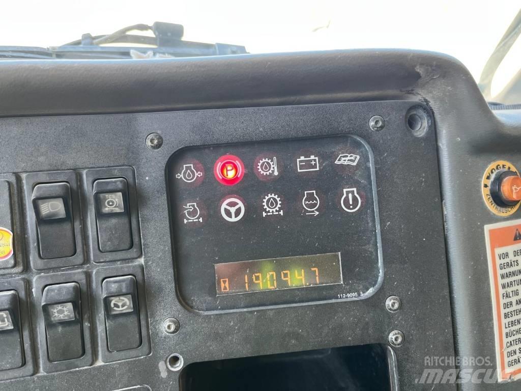 CAT 771D Карьерные самосвалы