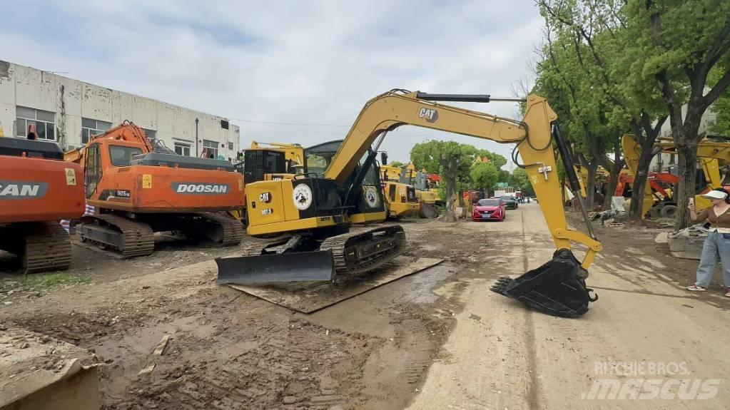 CAT 307 Малые экскаваторы 7т-12т