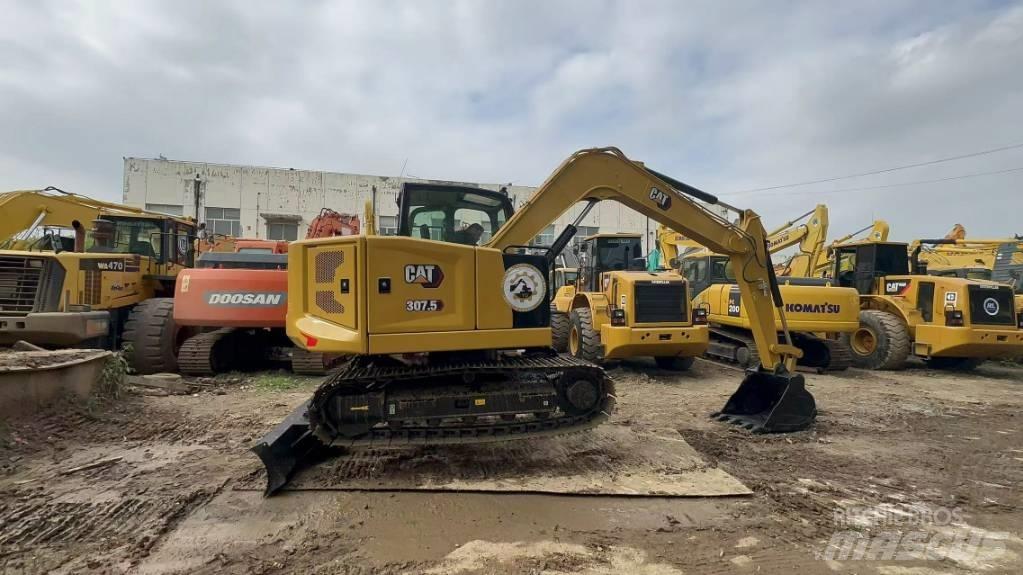 CAT 307 Малые экскаваторы 7т-12т