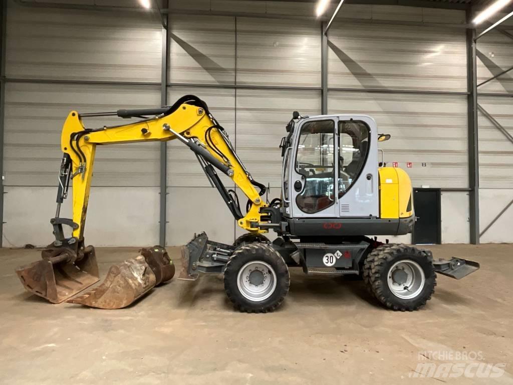 Neuson EW 100 Колёсные экскаваторы