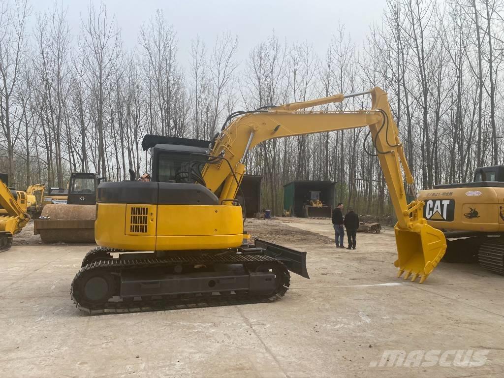 Komatsu PC128US Гусеничные экскаваторы