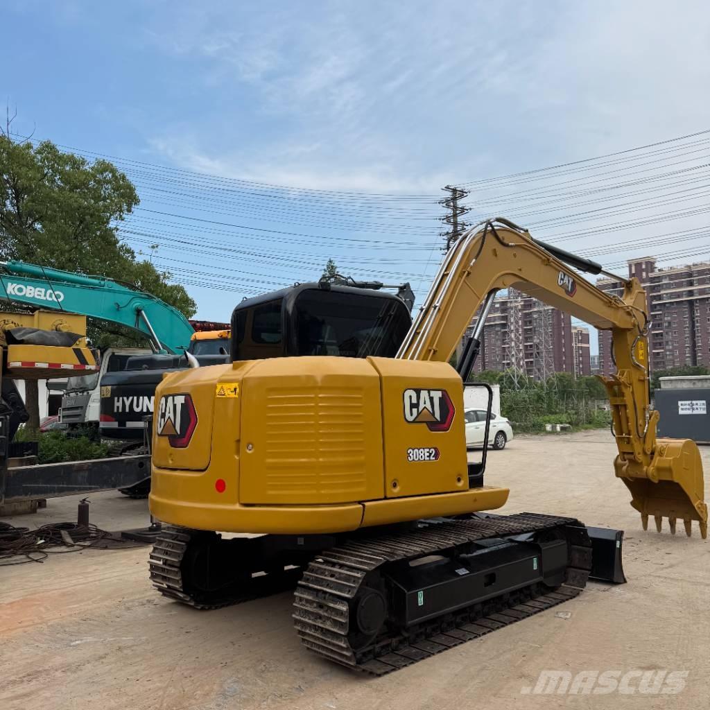 CAT 308 Малые экскаваторы 7т-12т