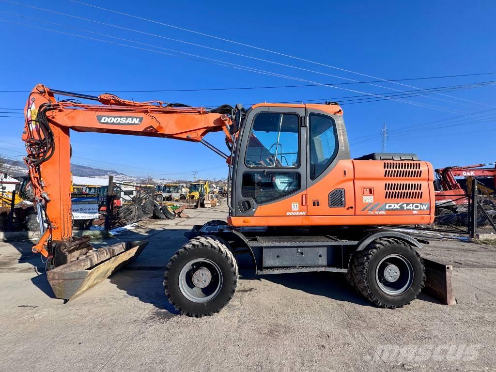 Doosan DX 140 W-3 Колёсные экскаваторы