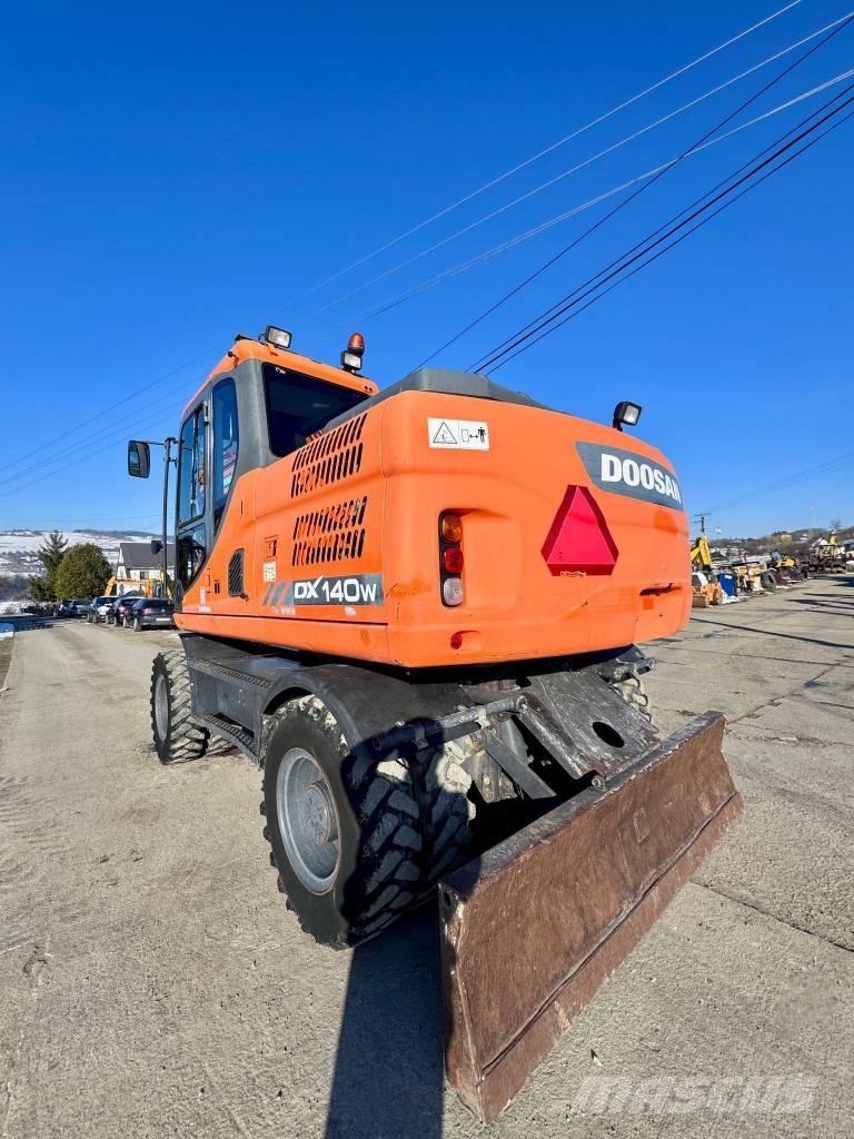 Doosan DX 140 W-3 Колёсные экскаваторы