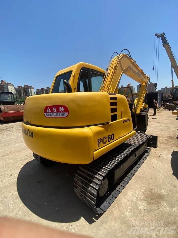 Komatsu PC60-7 Гусеничные экскаваторы