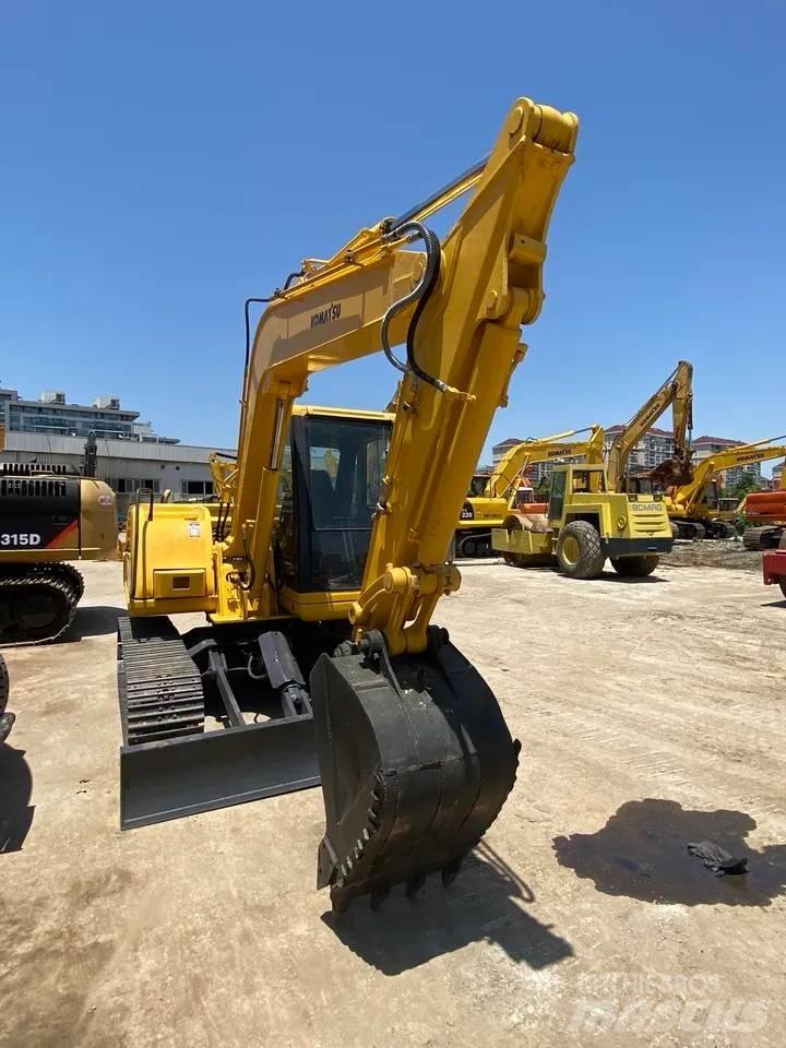 Komatsu PC60-7 Гусеничные экскаваторы