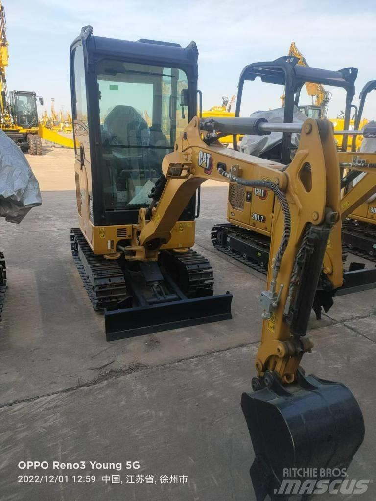 CAT 302 CR Колёсные экскаваторы