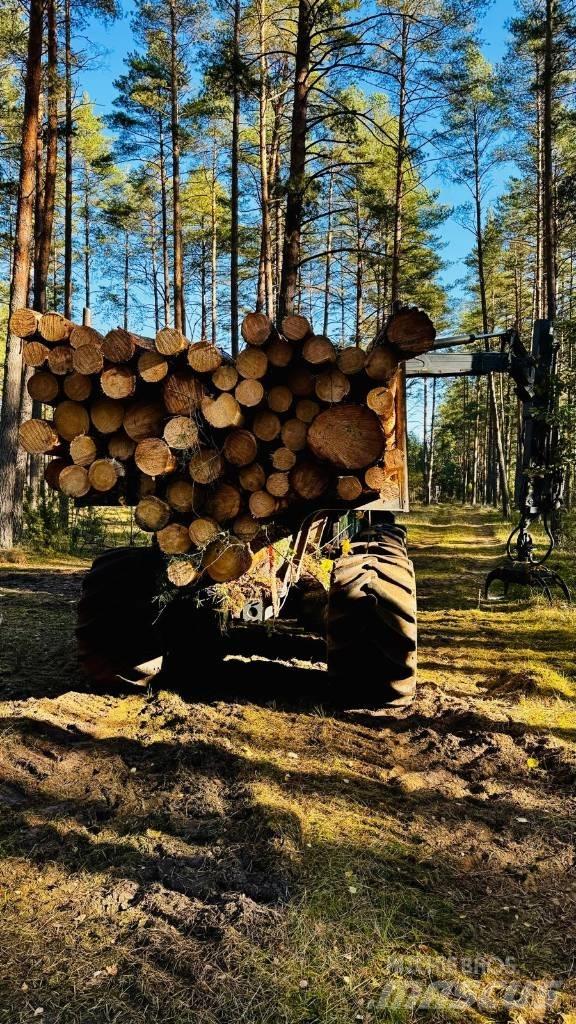 John Deere 1010G Форвардеры