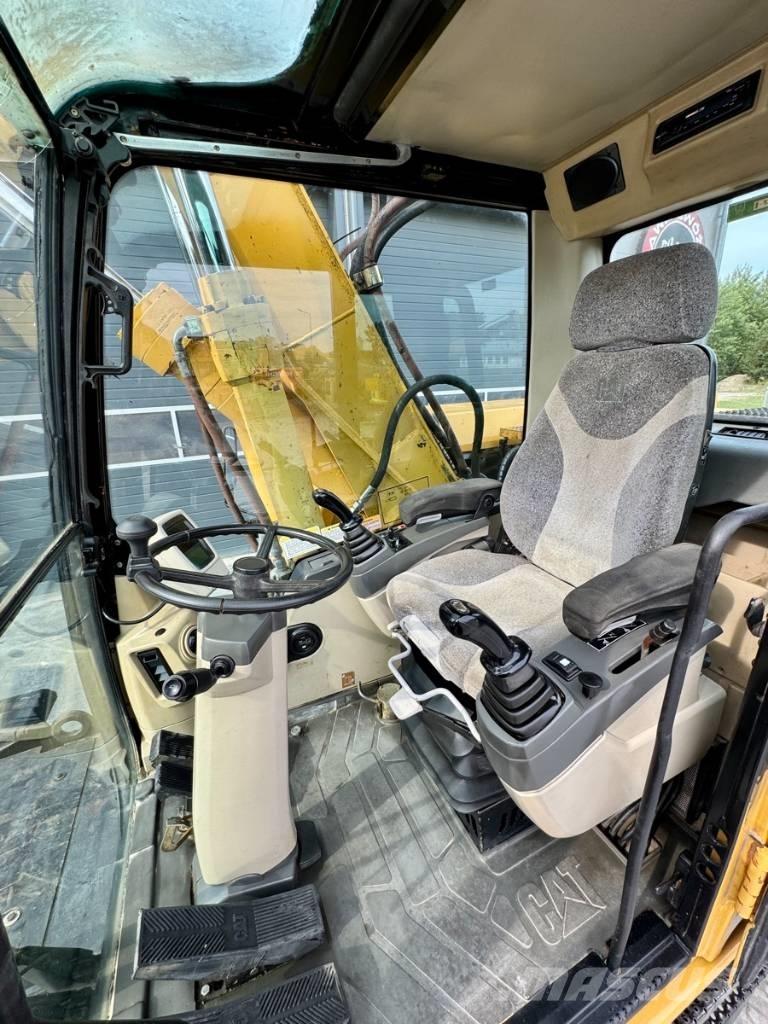 CAT M 318 C Колёсные экскаваторы