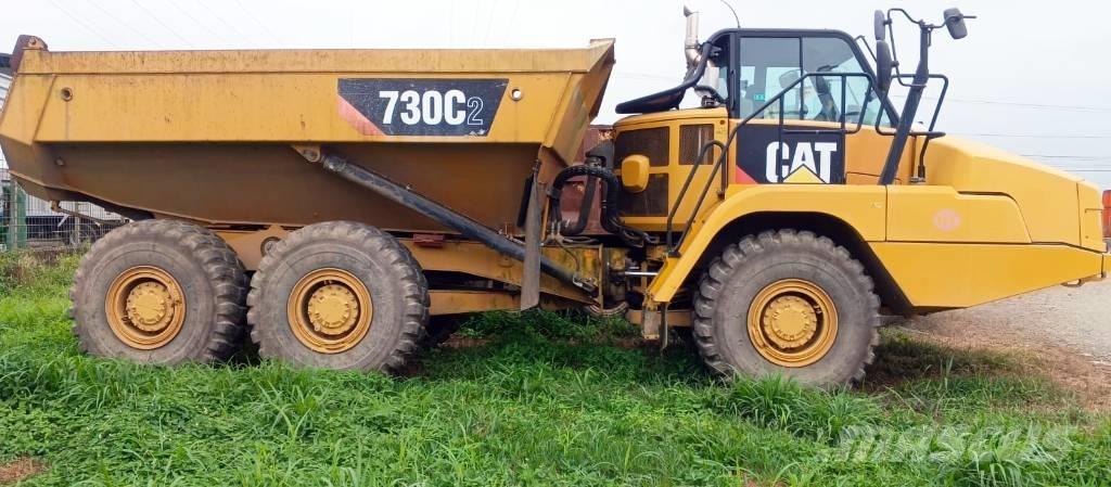 CAT 730 C 2 Шарнирно-сочленённые самосвалы