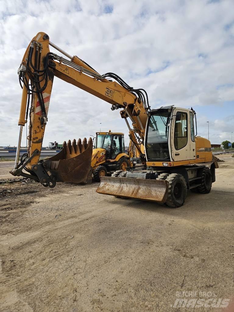 Liebherr 314 Колёсные экскаваторы