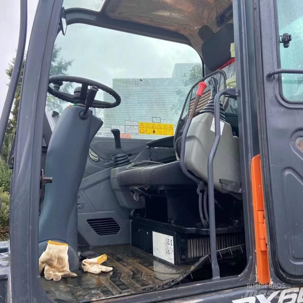 Doosan DX60W Колёсные экскаваторы
