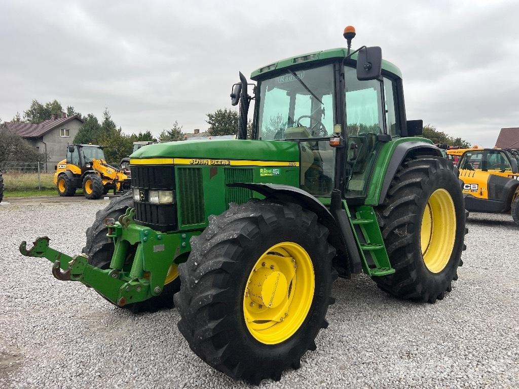 John Deere 6910 Трактора