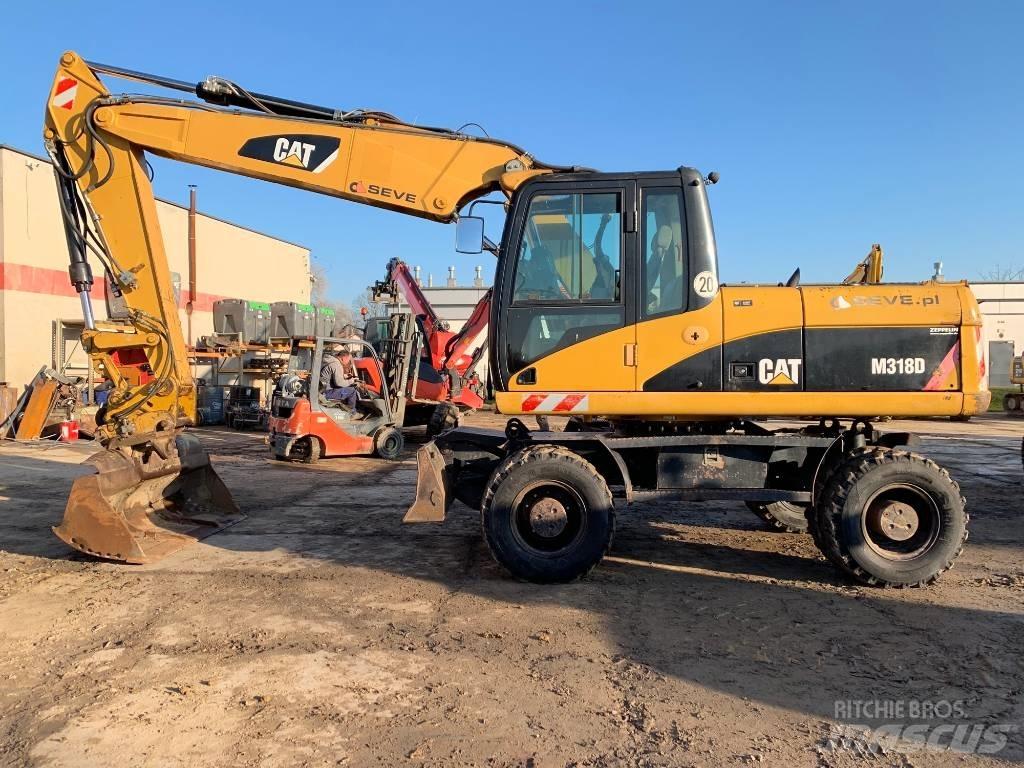 CAT M 318 D Колёсные экскаваторы