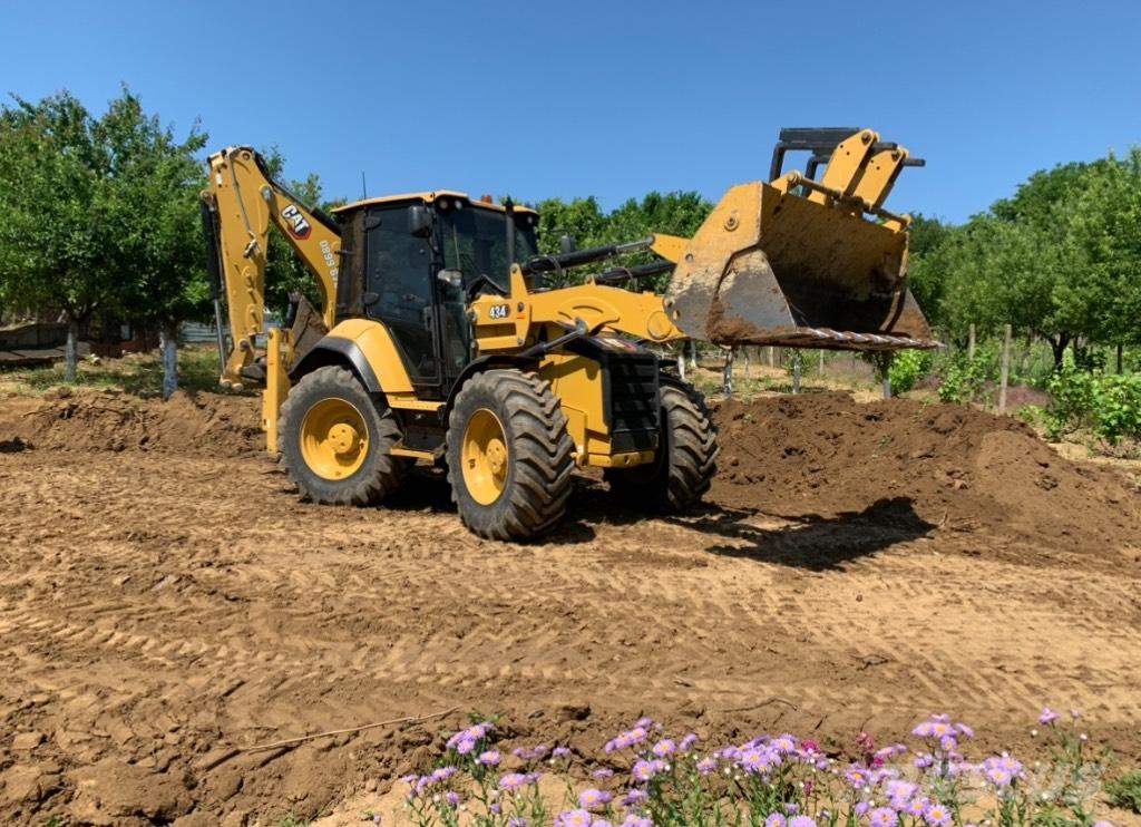 CAT 434 Экскаваторы-погрузчики