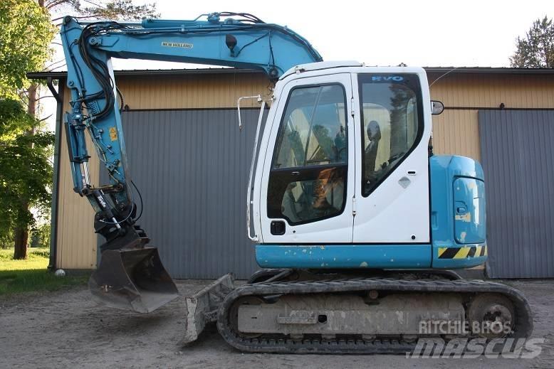  New Hollan E 70 BSR Малые экскаваторы 7т-12т