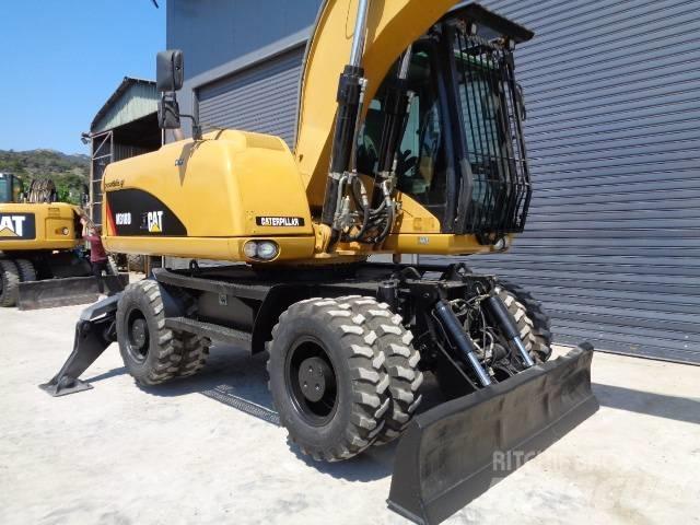 CAT M 318 D Колёсные экскаваторы