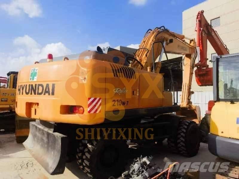 Hyundai 210W-7 Колёсные экскаваторы