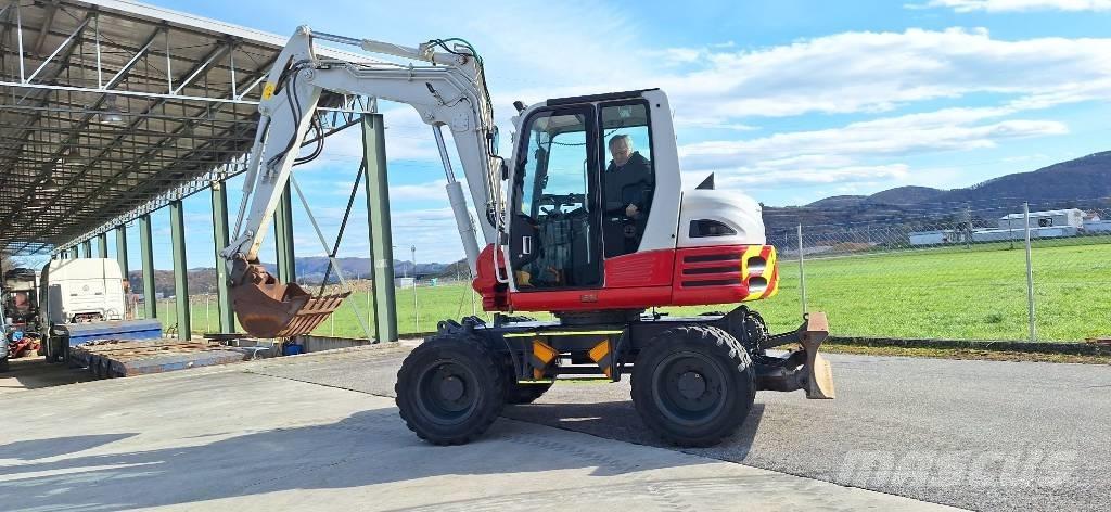 Takeuchi TB 295 W Колёсные экскаваторы