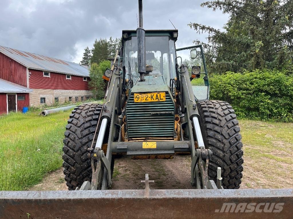 Lännen 740 Экскаваторы-погрузчики