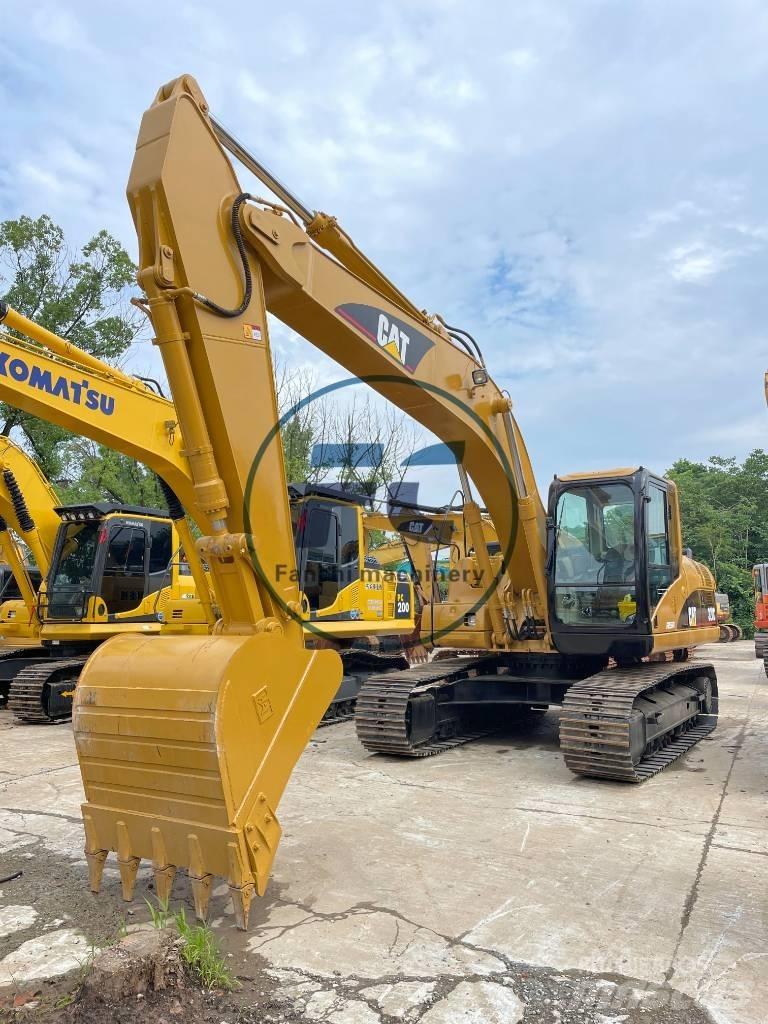 CAT 320C Малые экскаваторы 7т-12т