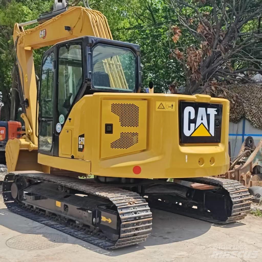 CAT 310 Малые экскаваторы 7т-12т