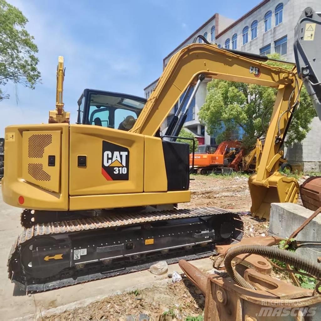 CAT 310 Малые экскаваторы 7т-12т