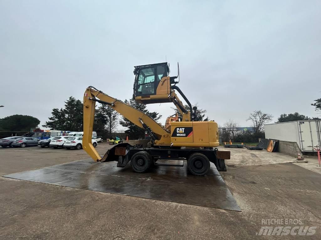 CAT MH3022 Колёсные экскаваторы