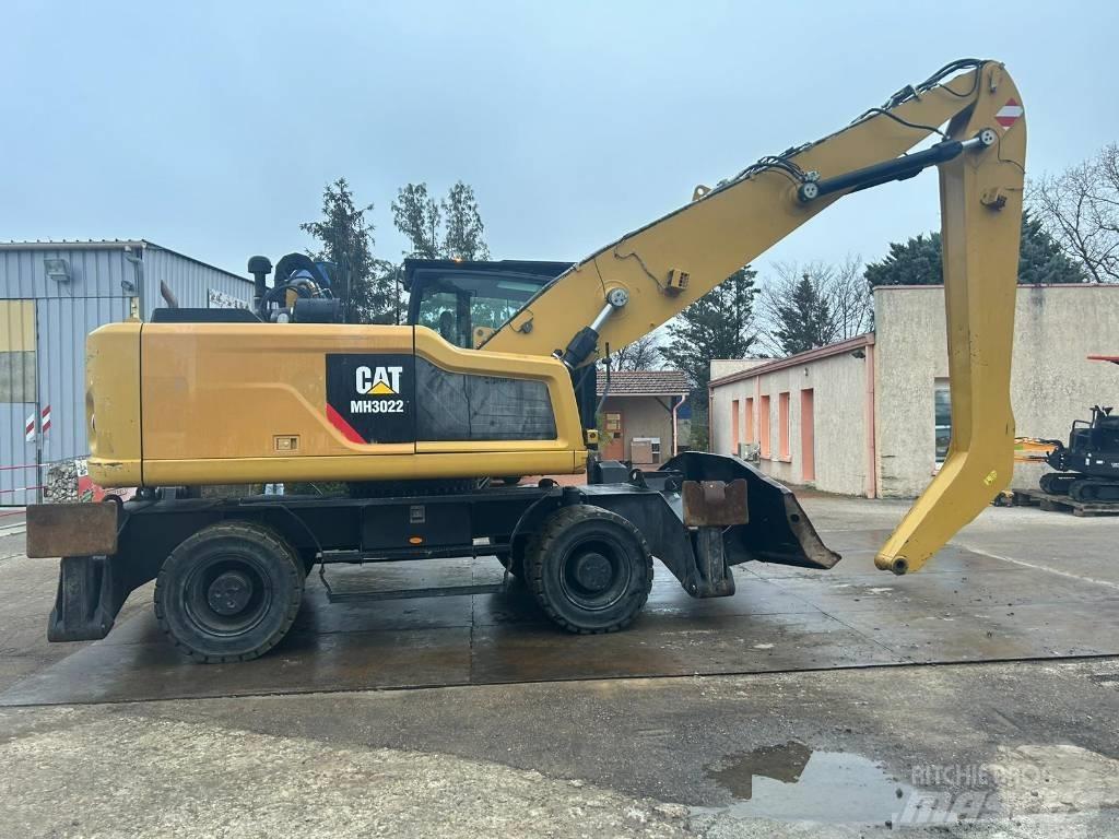 CAT MH3022 Колёсные экскаваторы
