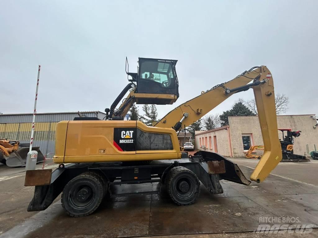 CAT MH3022 Колёсные экскаваторы