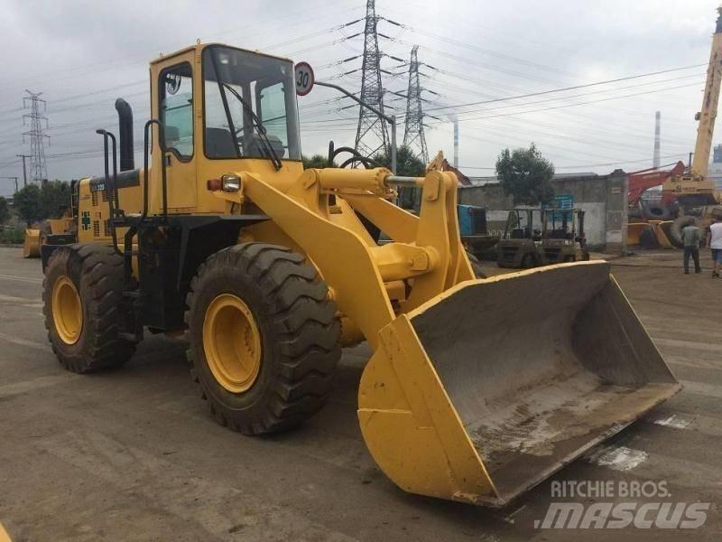 Komatsu WA 320 Экскаваторы-погрузчики