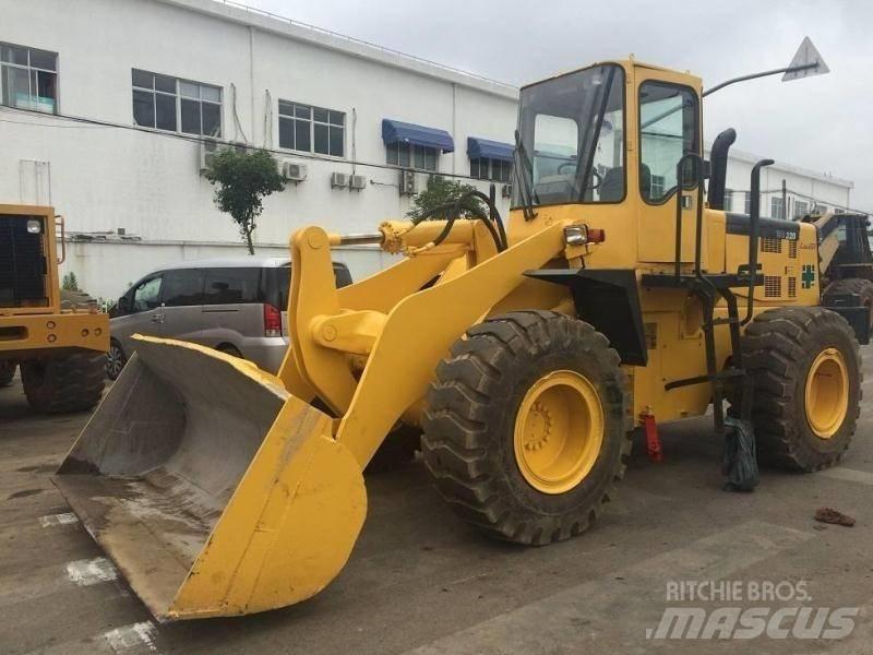 Komatsu WA 320 Экскаваторы-погрузчики