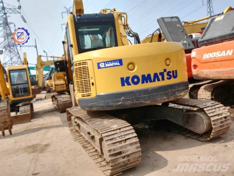 Komatsu PC 128 US Малые экскаваторы 7т-12т