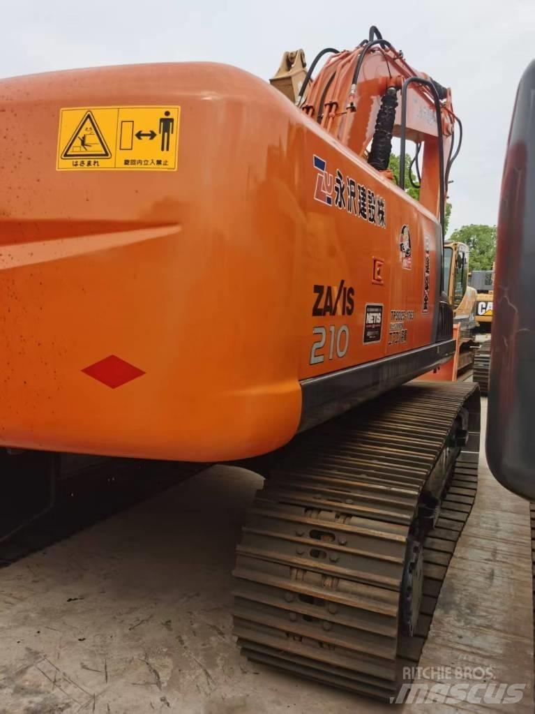 Hitachi ZX 210 Гусеничные экскаваторы