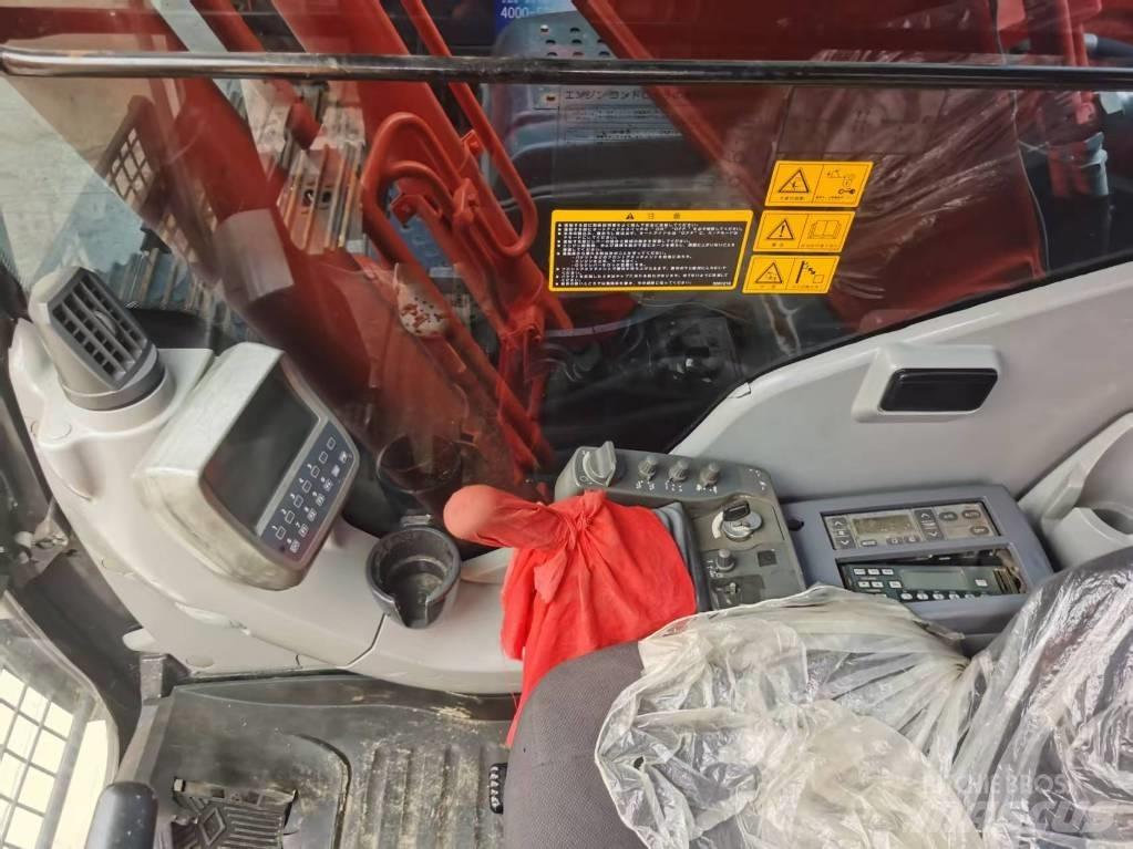 Hitachi ZX 210 Гусеничные экскаваторы