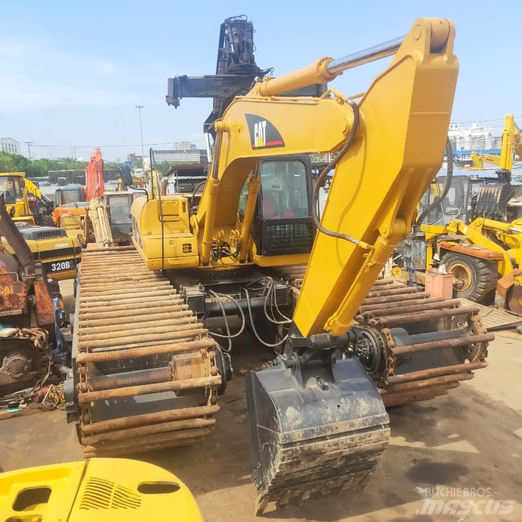 CAT 320C Экскаваторы-амфибии