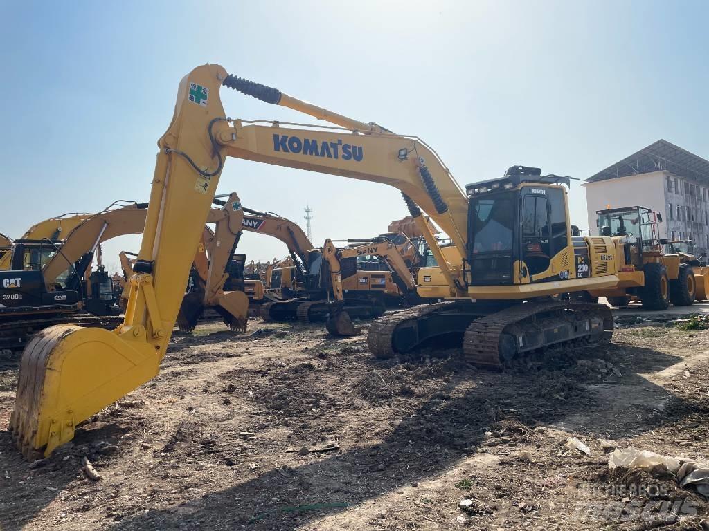 Komatsu 210 Гусеничные экскаваторы