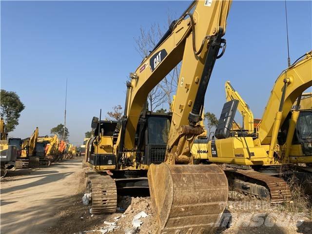 CAT 318D Гусеничные экскаваторы