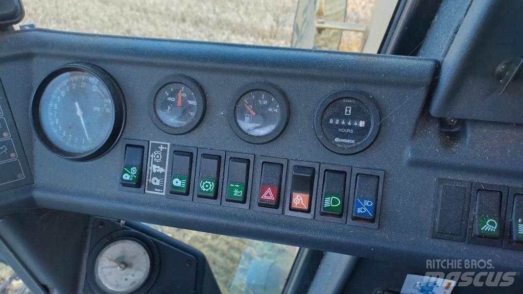 New Holland TC 54 Зерноуборочные комбайны